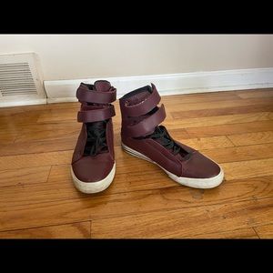 Maroon high top Supra’s